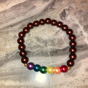 Rainbow glass brown bracelet for 8” wrist. Double knot & glued in. Hand-crafted.